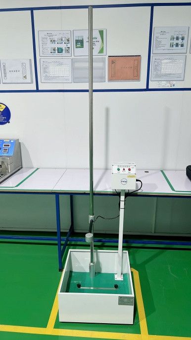 Falling ball impact tester