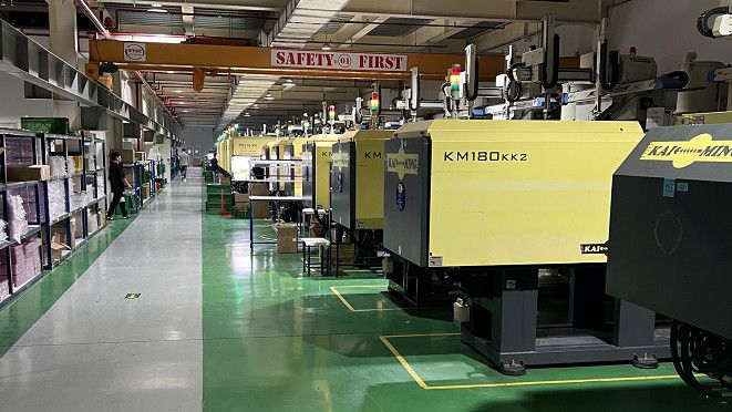 Row of injection molding machines